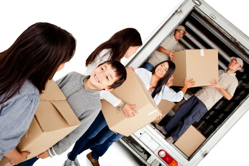 Man with van moving boxes and furniture in Fulham
