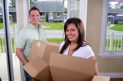 Professional movers handling furniture during a local Fulham relocation