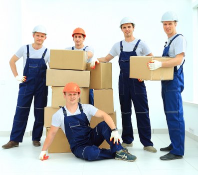 Fulham moving service with boxes and furniture ready for transport