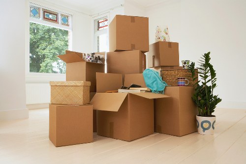 Removal van loading furniture outside a Fulham property